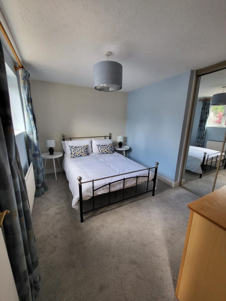 Image is after home sellers consultation. The bedroom now has a defined purpose - as a bedroom. The gym equipment was removed, all surplus furniture was removed and the bedroom now looks like a lovely guest room. 